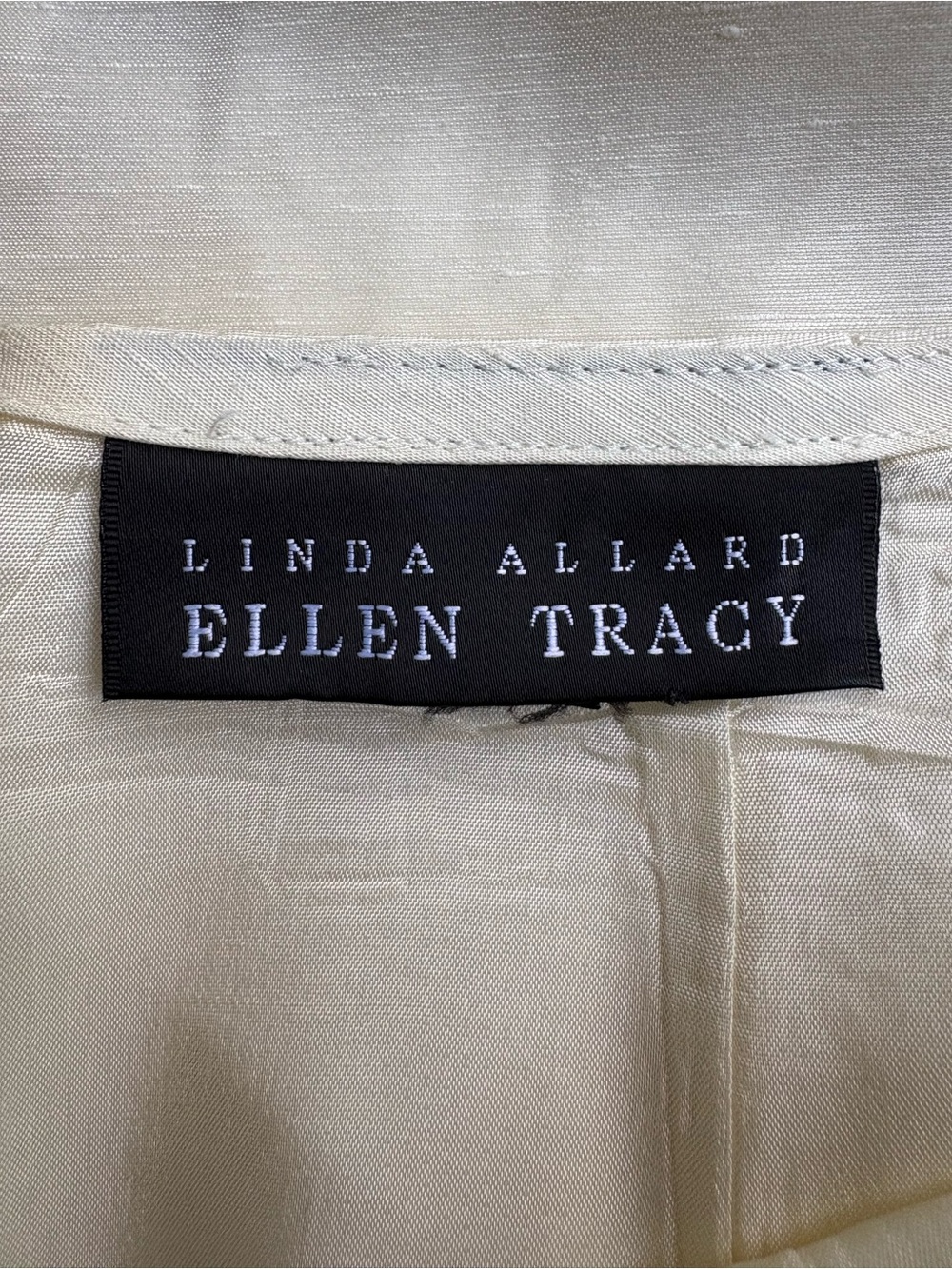 ELLEN TRACY. Ivory silk pencil skirt.